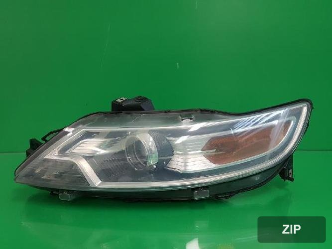 Ford Taurus 2010 — фара левая AG13 13006