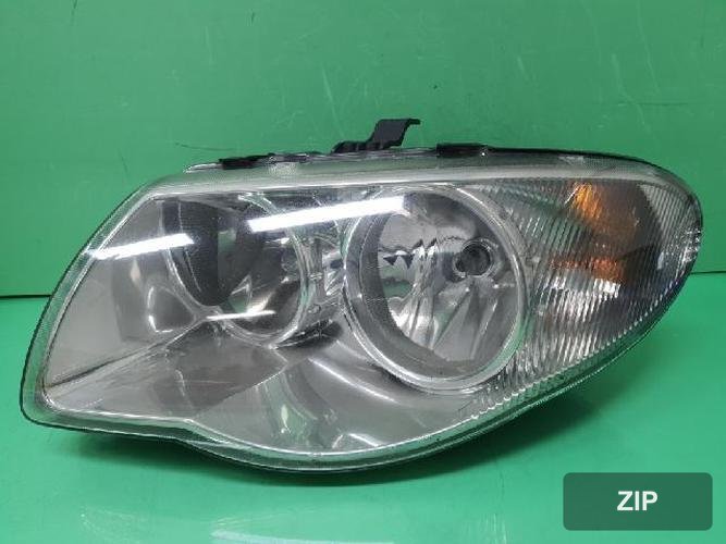 Chrysler Grand Voyager 2007 — фара левая 04857831AC