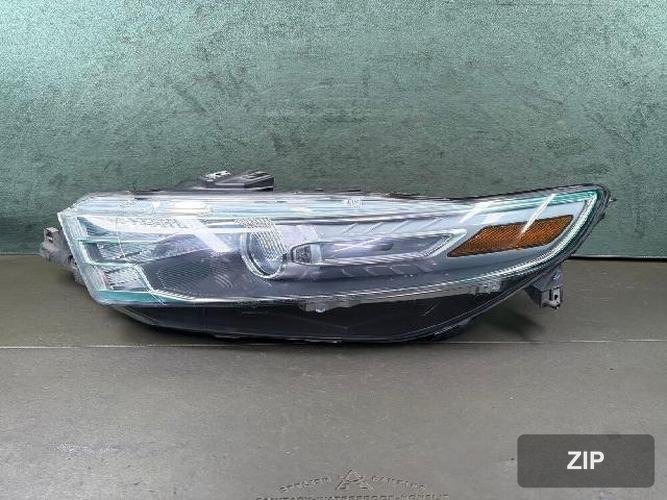 Ford Taurus 2013 — фара левая 2