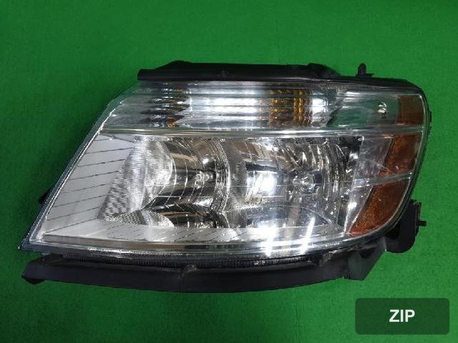 Ford Taurus 2009 — фара левая 4