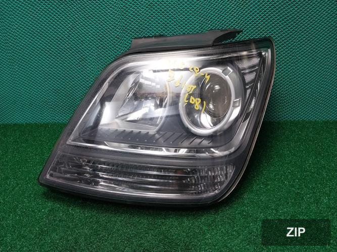 Kia Mohave 2008 — фара левая 921012J000