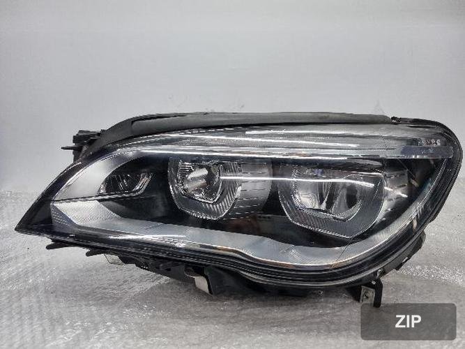 BMW 7 Series 2011 — фара левая (LH)
