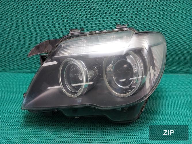 BMW 7 series 2006 — фара левая HID 6937225