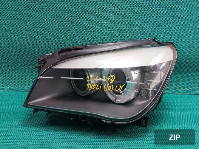 BMW 7 Series 2010 — фара левая HID 63117225229