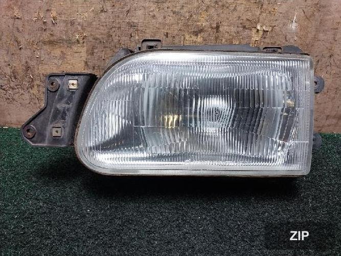 Kia Tauren 2001 — фара левая AA10051040