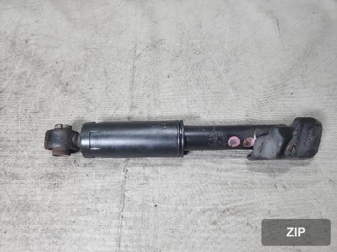 Стойка амортизатора задняя правая 55310-2W300