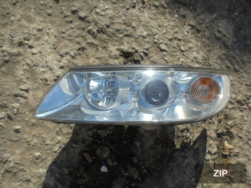 Фара передняя левая HID 921013L400