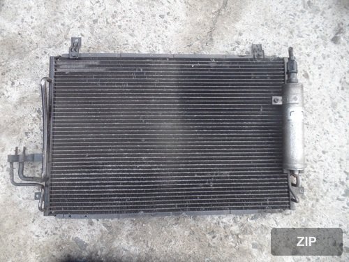 Кондиционер конденсор Carens 2 (X-Track) LPG
