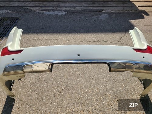 Накладка заднего бампера Korando Turismo 7881021600, на 3 датчика (доработана под крюк буксировки)
