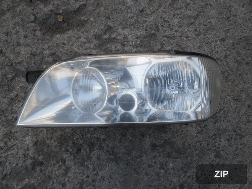 Фара передняя левая HID 921103B011 (стекло)