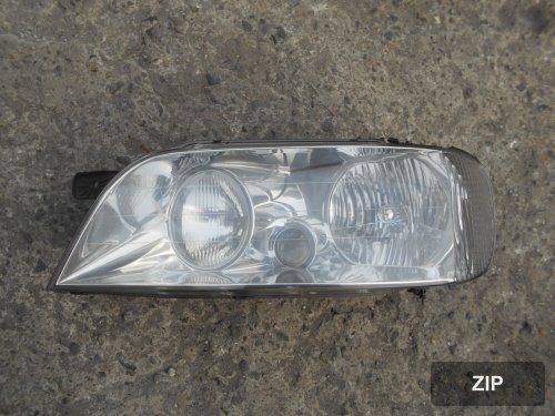 Фара передняя левая HID 921103B011 (стекло)